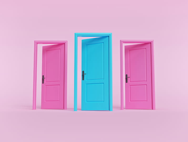 Three doors against a pink background